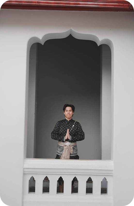 Ryan in traditional dress at a temple